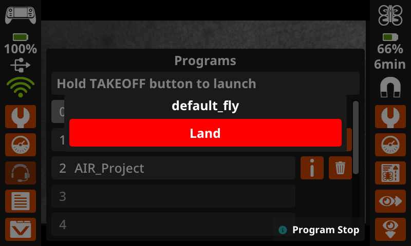 Stop Menu showed on the controller with default fly as the project name. Land button on the left in red and fly button on the right in green.