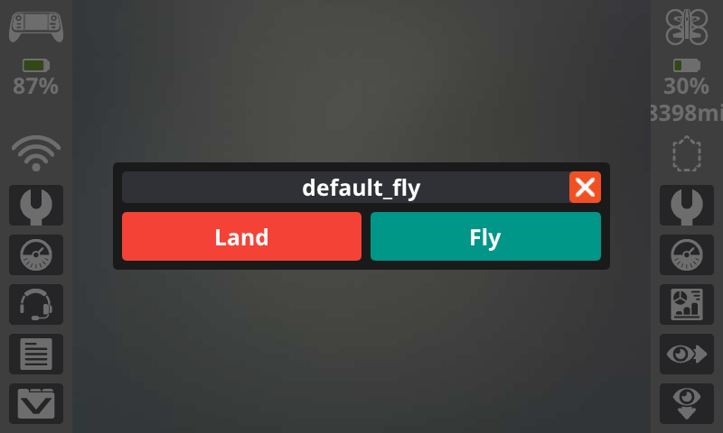 Stop Menu showed on the controller with default fly as the project name. Land button on the left in red and fly button on the right in green.