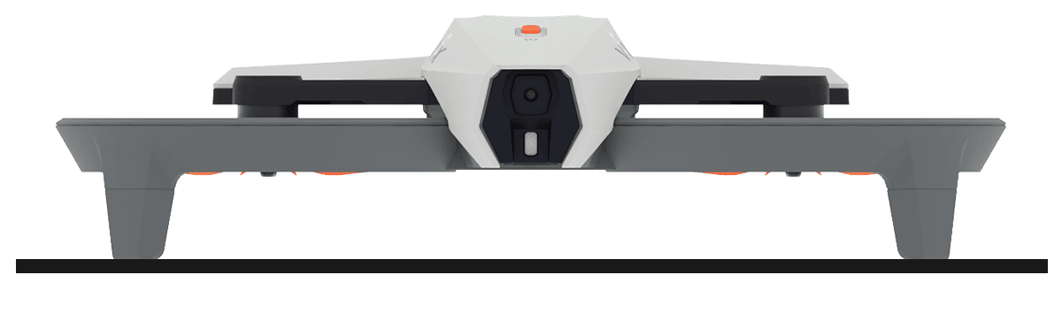 Ένα drone κάθεται σε μια επίπεδη επιφάνεια, με τη μύτη στραμμένη προς το μέρος σας.