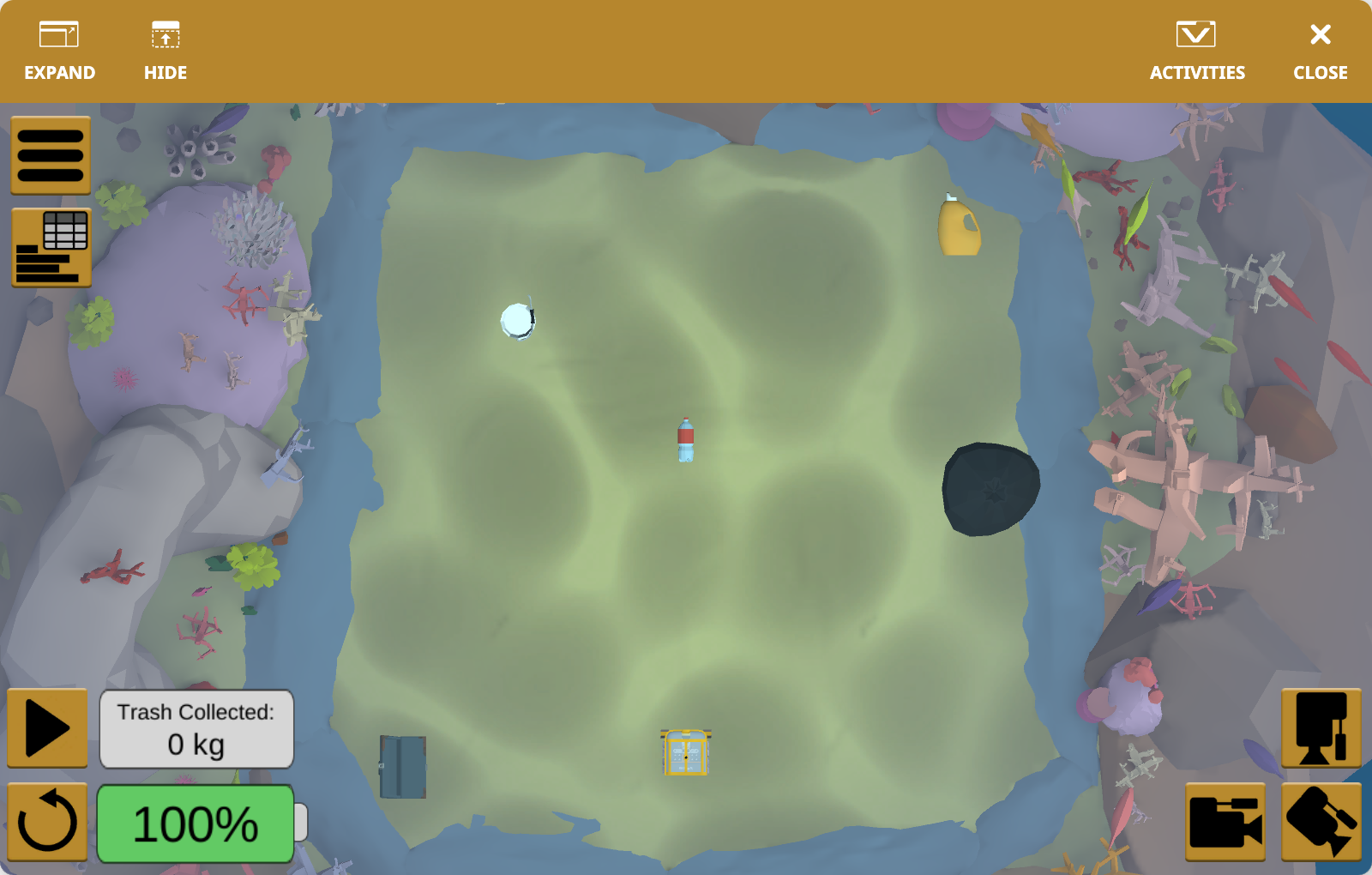 Το παράθυρο της παιδικής χαράς VEXcode VR που δείχνει την παιδική χαρά καθαρισμού κοραλλιογενών υφάλων. Δείχνει το υποβρύχιο ρομπότ VR να συλλέγει σκουπίδια από τον πυθμένα του ωκεανού.