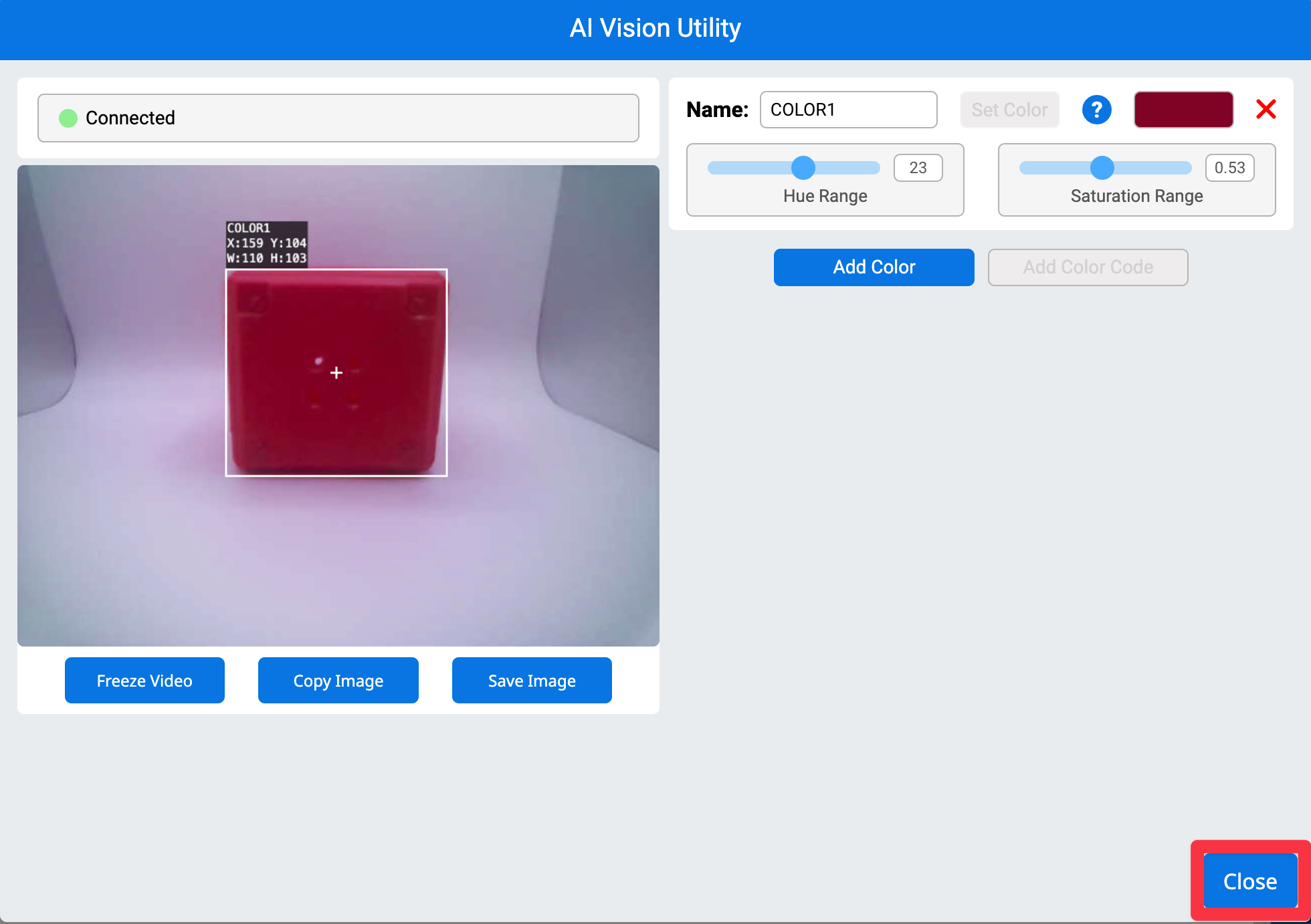 Utilidad de visión de inteligencia artificial en VEXcode AIM con un resaltado en el botón de cierre en la esquina inferior derecha.