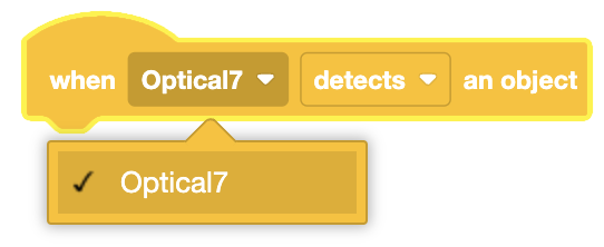 Diagrama que ilustra la funcionalidad del bloque Cuando sensor óptico en la programación de bloques VEXcode.