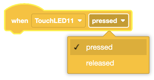 Un bloque con muescas de color amarillo con la etiqueta 'cuando se presionó TouchLED11' con un menú desplegable expandido para mostrar las opciones 'presionado' y 'liberado', con 'presionado' seleccionado.