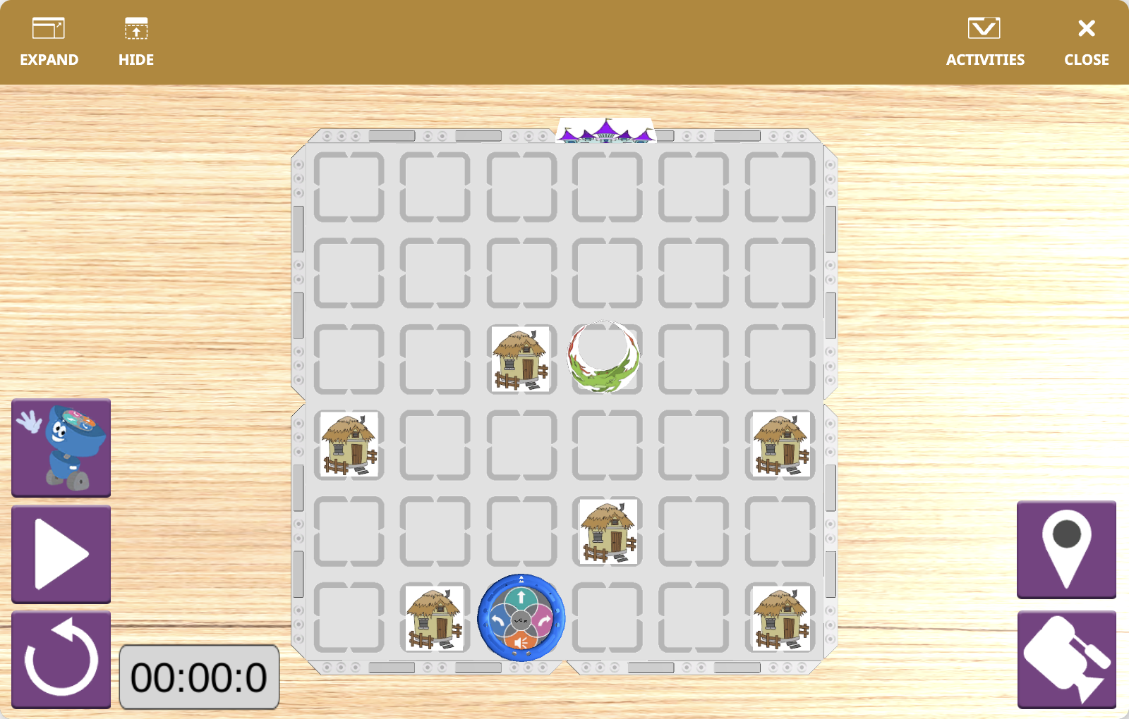 The VEXcode VR Playground window showing the 123 Playspace Playground. It shows the VR Robot navigating around houses and a dragon to reach the castle.