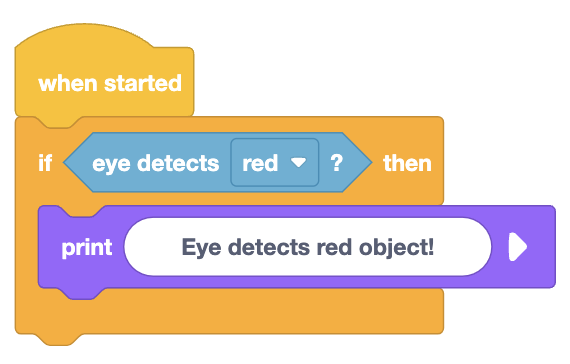 Imagen que muestra al Robot 123 detectando un objeto azul usando su sensor ocular frontal en un contexto de programación.