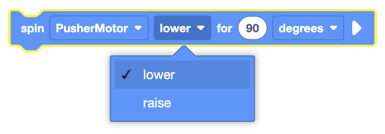 The image shows a coding block that controls a motor labeled "PusherMotor." The block specifies that the motor should spin in the "lower" direction for 90 degrees. A dropdown menu is visible, allowing the user to select "lower" or "raise" as the direction.