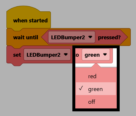Screenshot of the finished project, with the Set Bumper color block's dropdown open, showing red, green, and off options, and green selected.