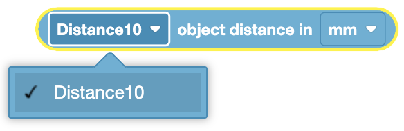 Image of a device used for measuring object distance with a display showing distance readings and settings.