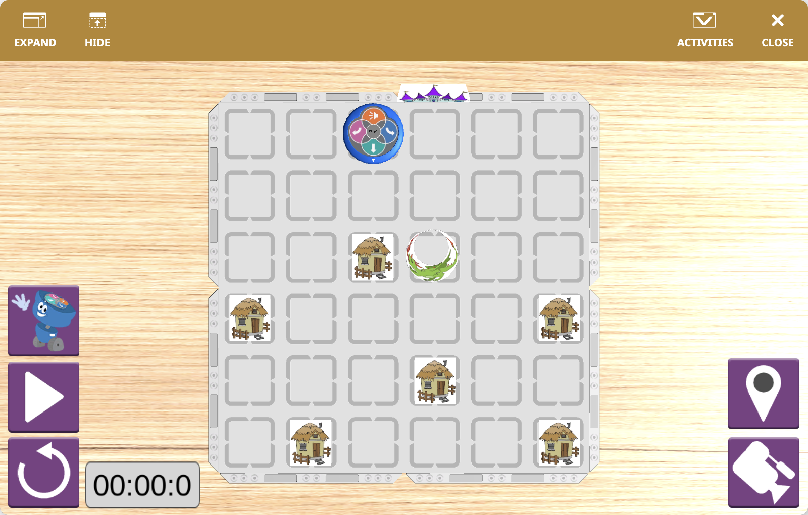 The VEXcode VR Playground window showing the 123 Playspace Playground. It shows the VR Robot collecting materials from the village and returning to the castle.