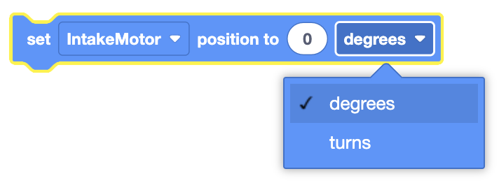 The image displays a visual coding block where the "IntakeMotor" is being set to a position of 0 degrees. The dropdown menu for the unit of measurement is open, showing "degrees" as the selected option, with "turns" as an alternative option. The number "0" is set as the position value in the white oval input field.